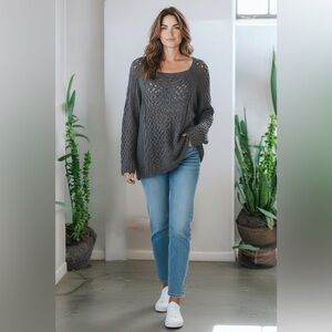 Catherine’s wide knit sweater
